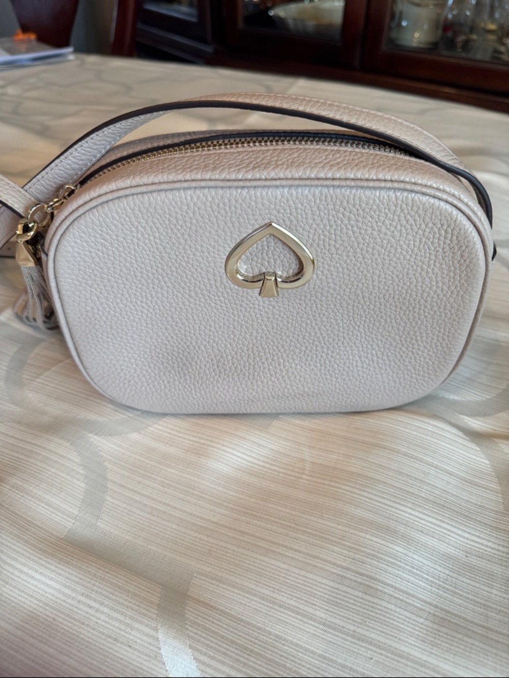 kate spade tan pebble leather crossbody with gold spade logo